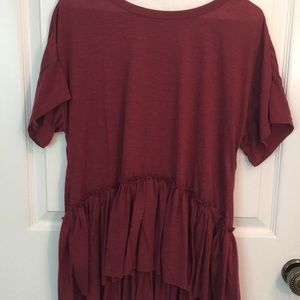 A ruffled blouse... never worn